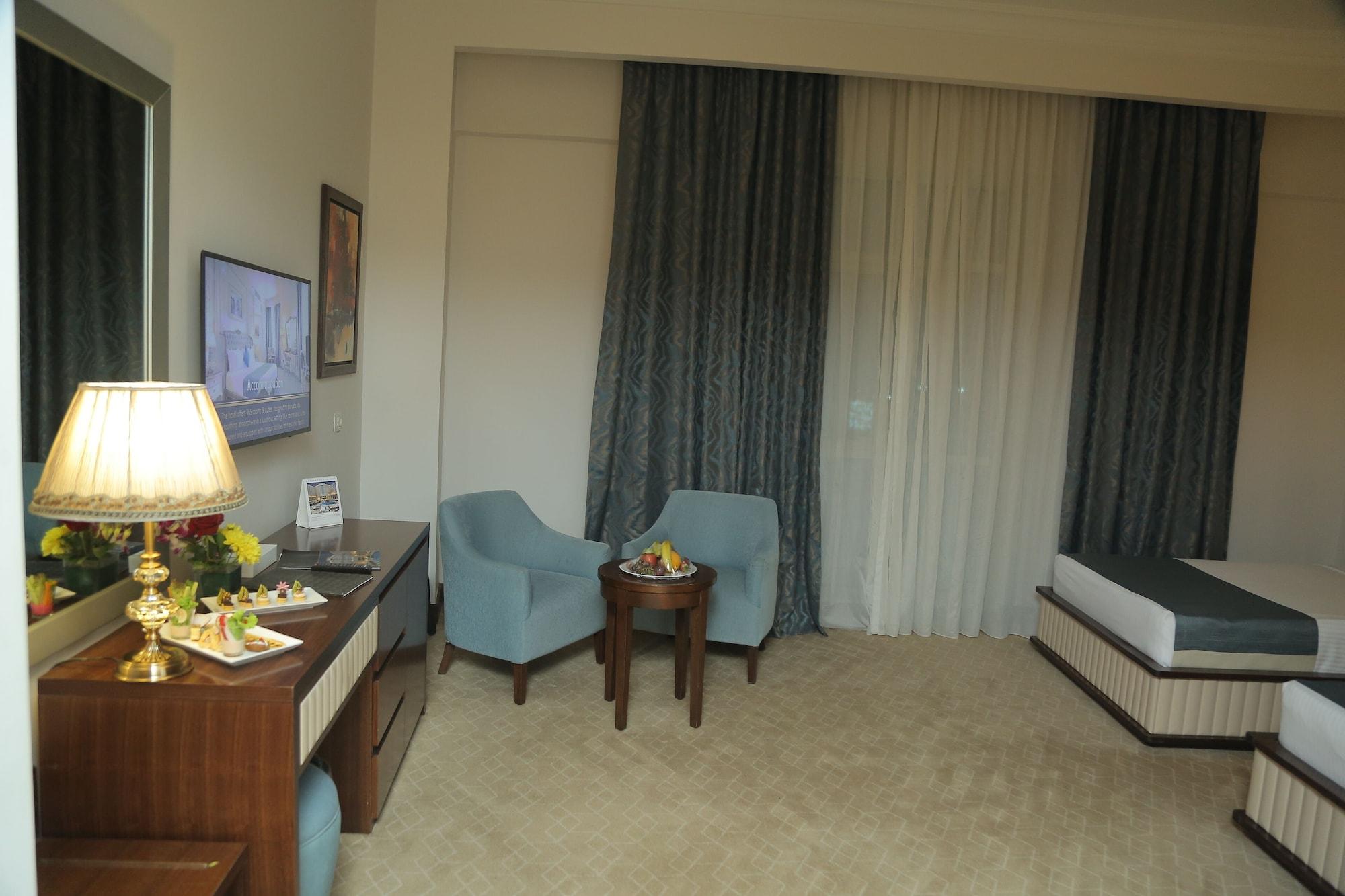 فندق توليب الذهبي بلازا New Cairo المظهر الخارجي الصورة A room at the hotel